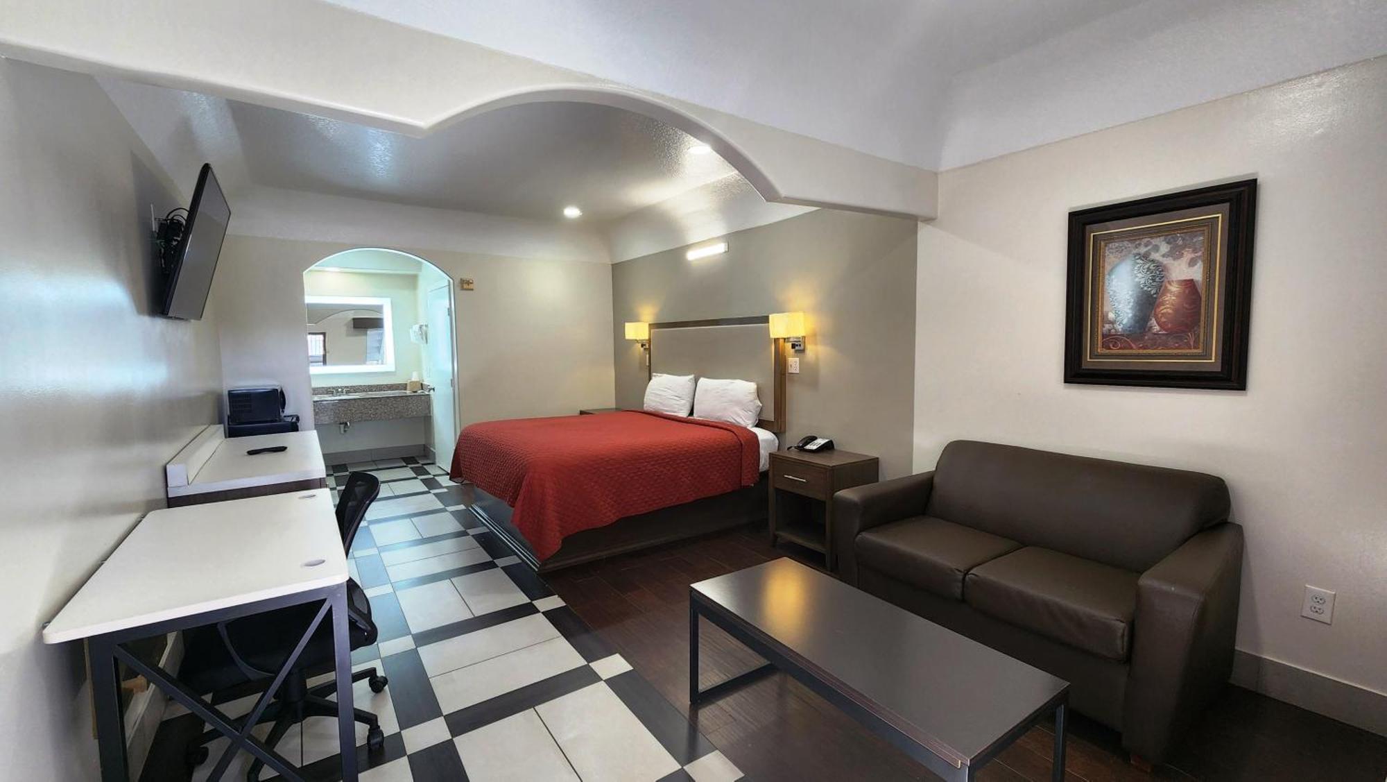 Scottish Inn & Suites Sam Houston Parkway מראה חיצוני תמונה
